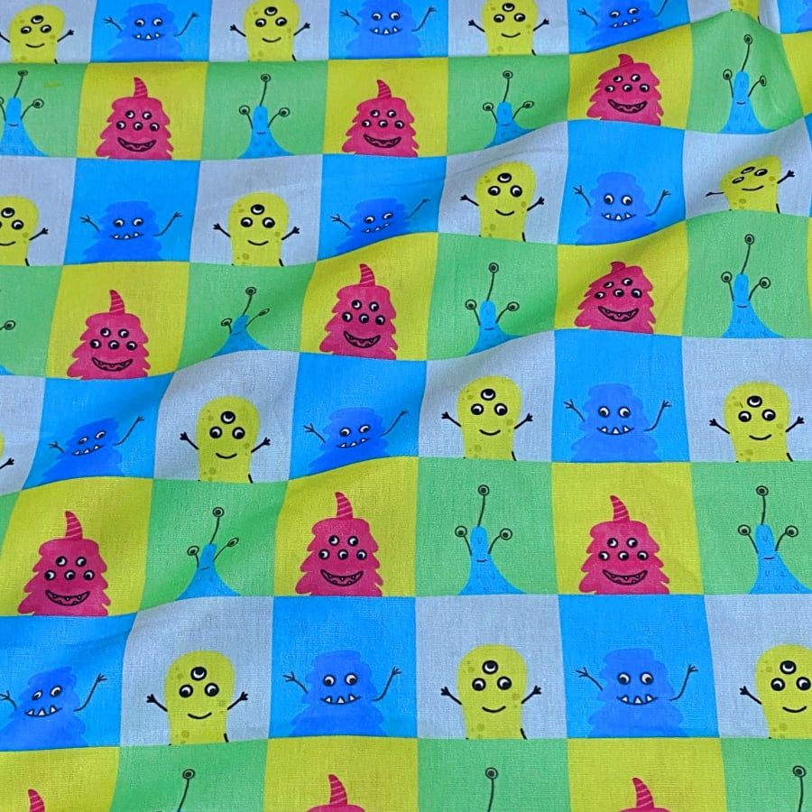 Tecido Tricoline Monstrinhos Felizes e Coloridos