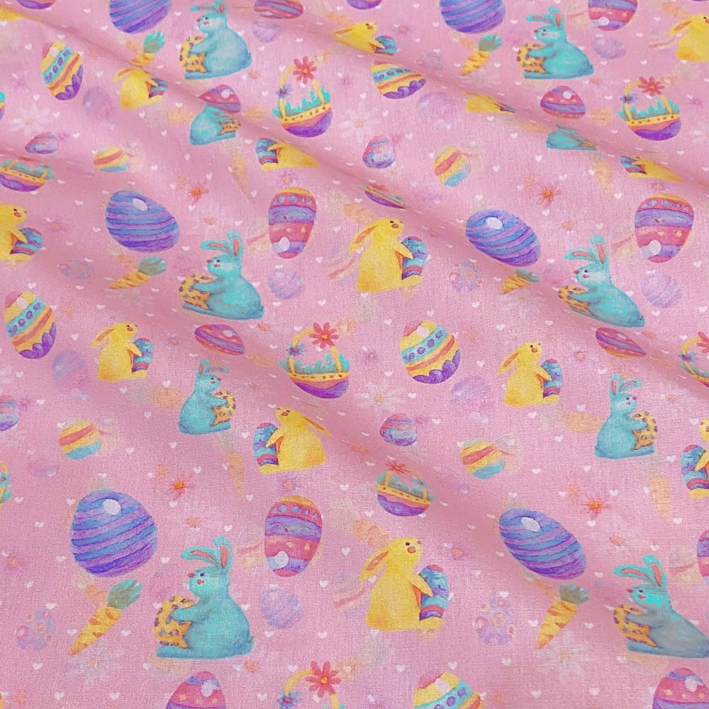 Tecido Tricoline Coelhos e Ovos de Pascoa Colorido Fundo Rosa