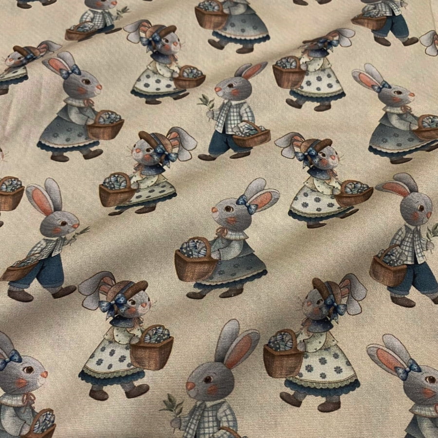 Tecido Tricoline Digital Coelhos e Coelhas Fundo Cru Pascoa Azul