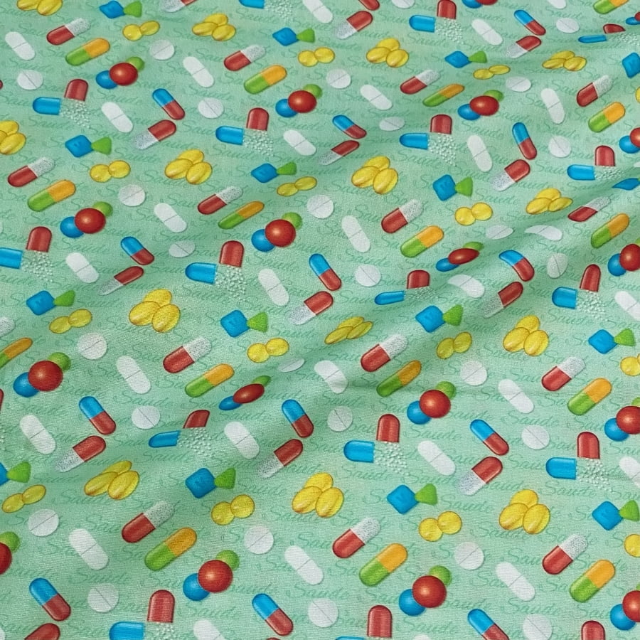 Tecido Tricoline Digital Pilulas e Comprimidos Fundo Verde Coleção Saúde 